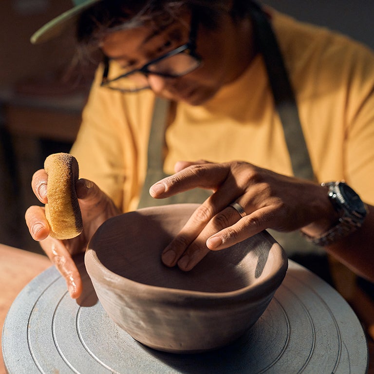 Diego Oka at work in his studio.