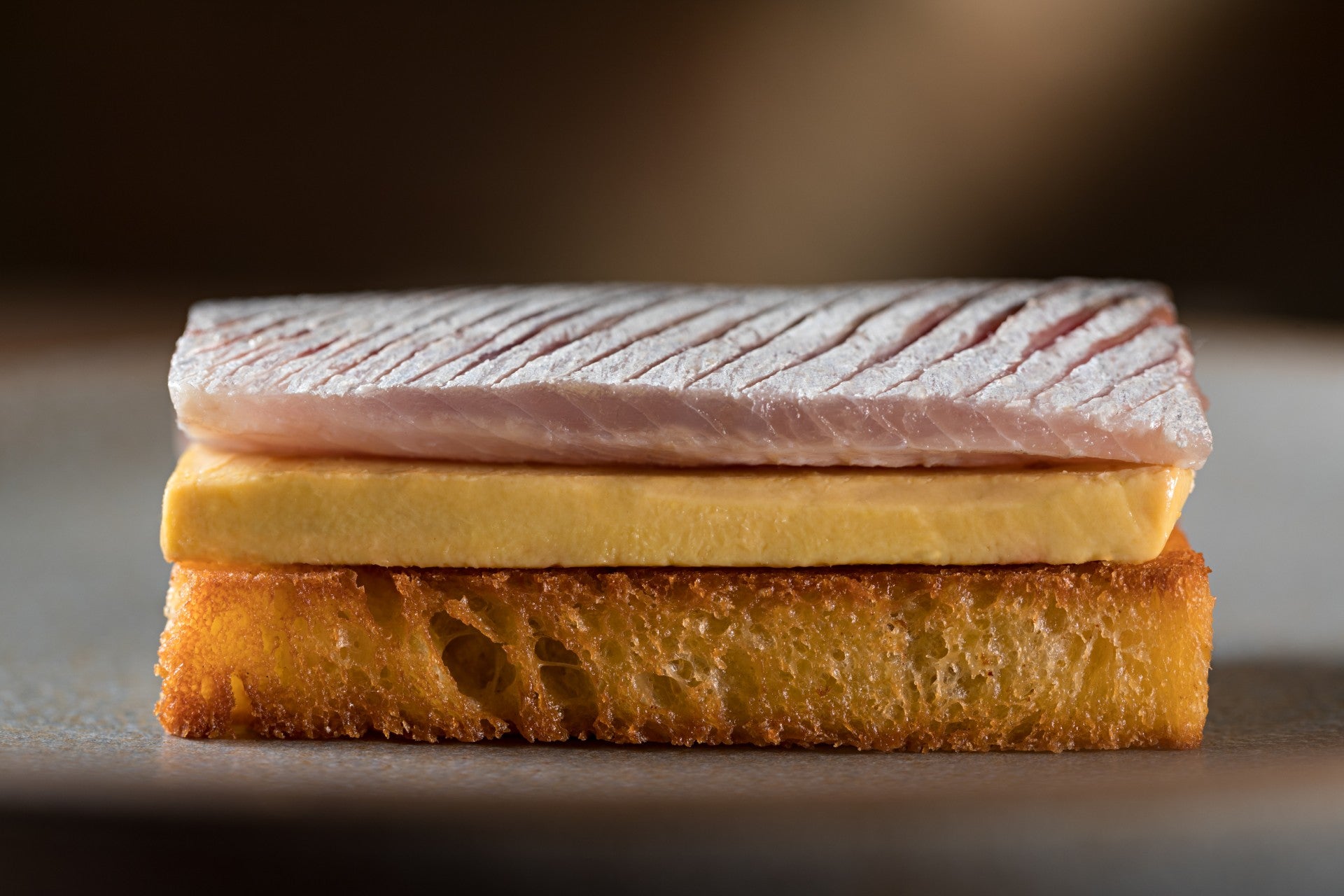 Pickled sardine, raw foie gras and brioche at Oteque in Rio de Janeiro.