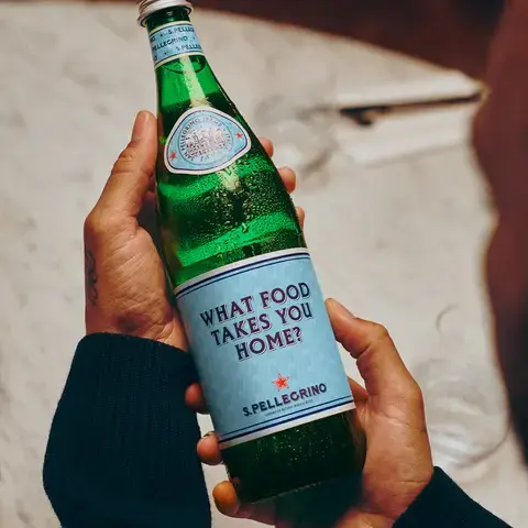 Lewis Hamilton with the S.Pellegrino limited edition bottle
