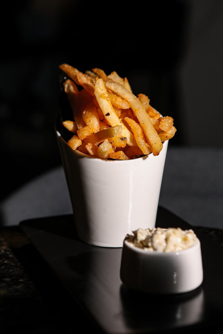 French Fries with Melted Leek Aioli at Apothecary Cocktail Bar