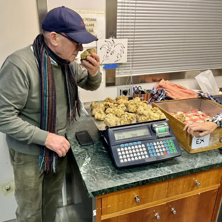 Beppe smelling truffles