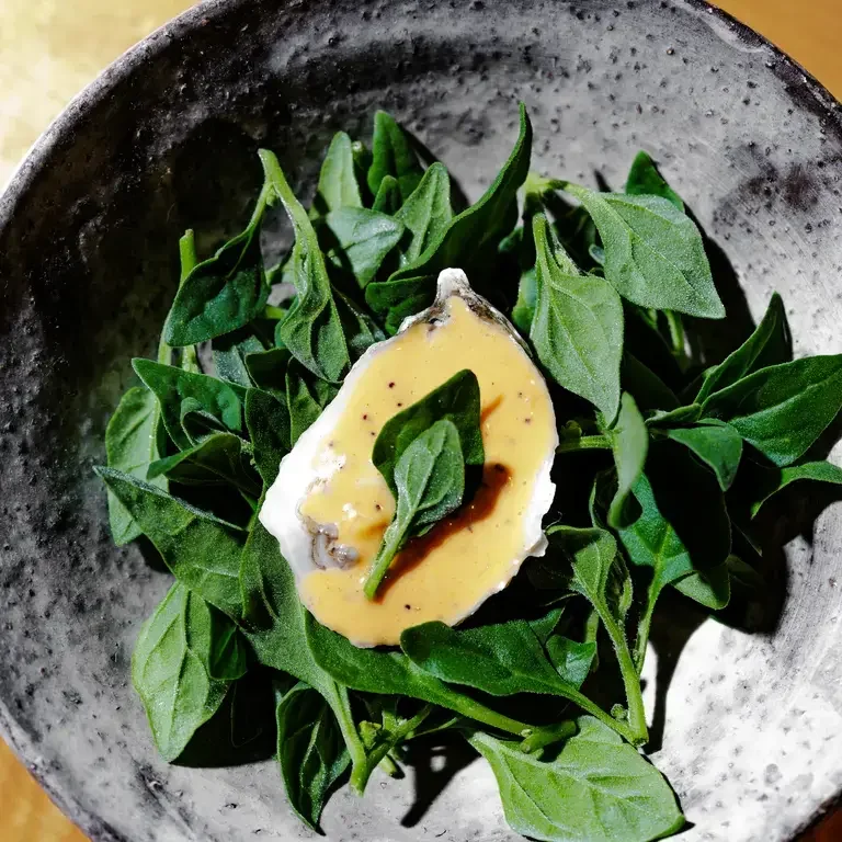 Raw Oyster, Bacon, Poppyseed at Bastion