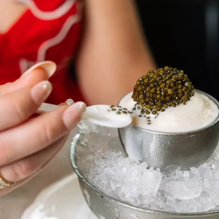 Miss River's crème fraîche ice cream comes topped with Imperial Golden Osetra caviar
