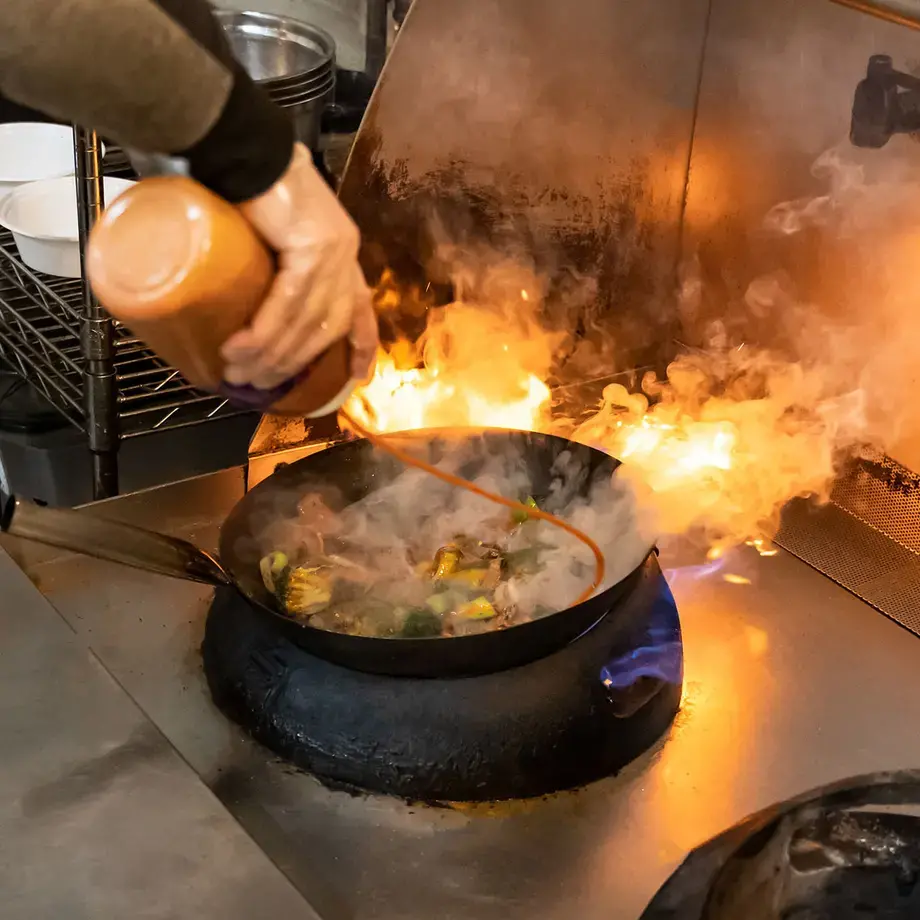 Wok on a fire
