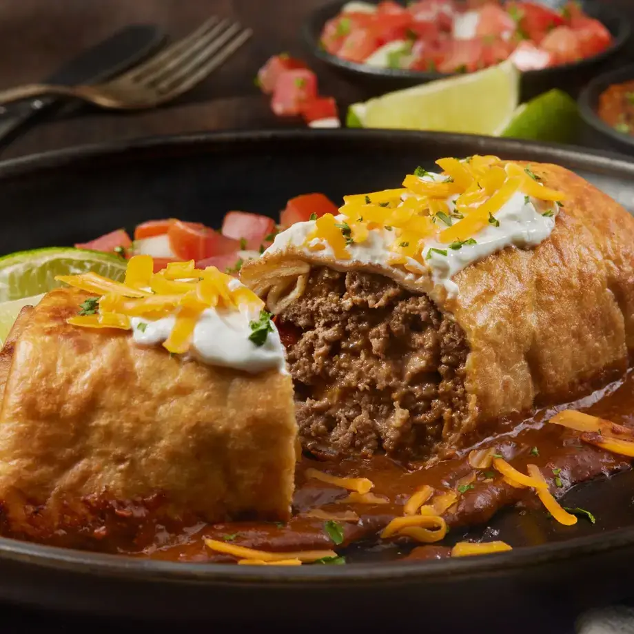 A chimichanga split in half.