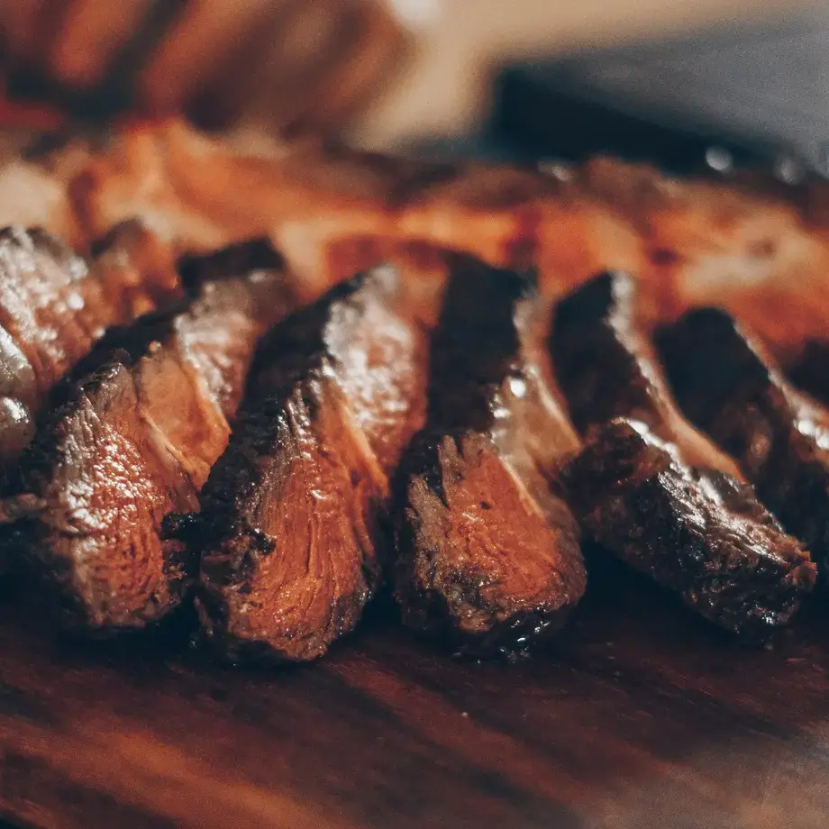 Medium cooked steak, sliced.