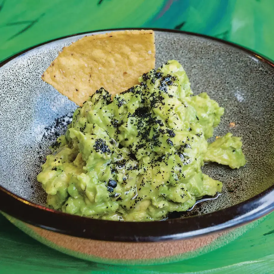 A bowl of homemade guacamole.