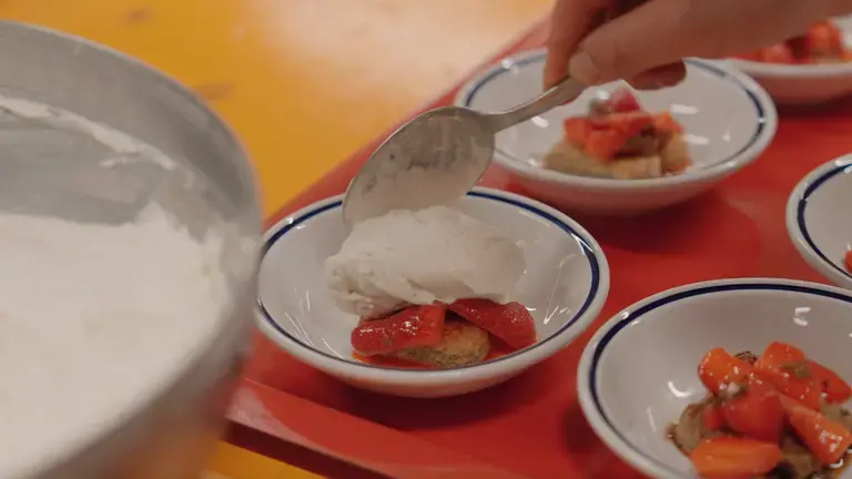 The chef plating the desserts