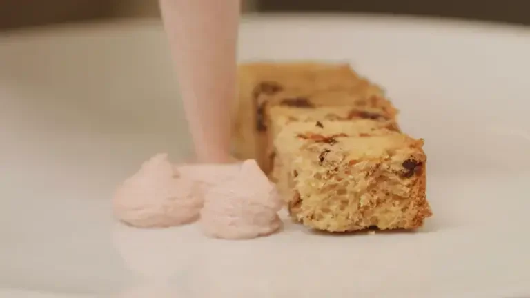 mortadella mousse arranged next to panettone