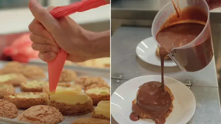 Filling desserts with a piping bag and coating with chocolate during a pastry service