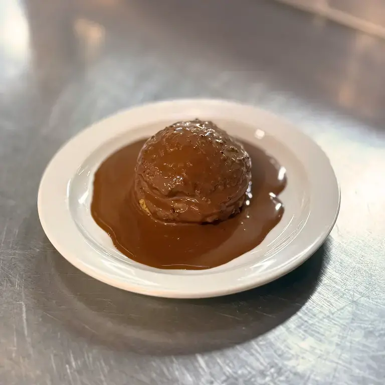 Paris-Brest With Custard and Chocolate Ganache Plated