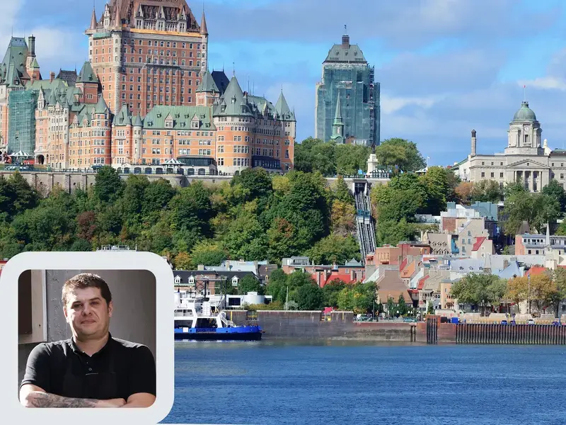 Chef Stéphane Modat and the Quebec City skyline.