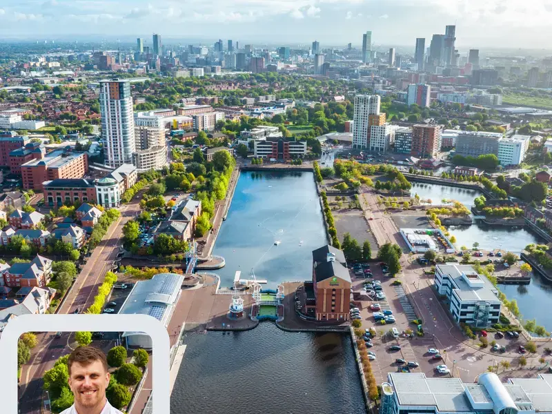 Chef Tom Barnes and the Manchester skyline.
