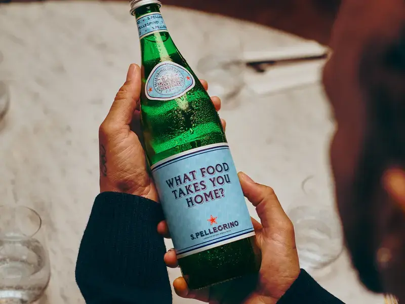 Lewis Hamilton with the S.Pellegrino limited edition bottle