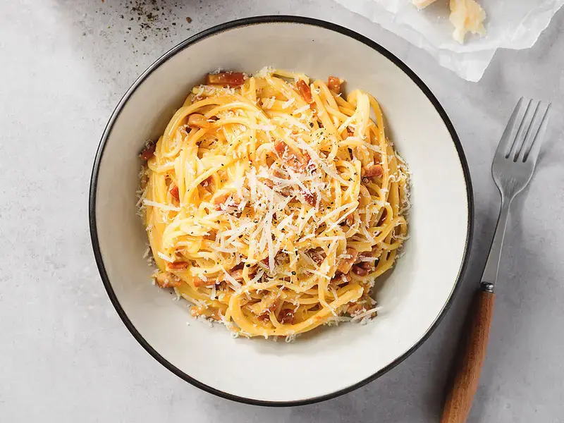 A bowl of carbonara, the famous Roman pasta dish.