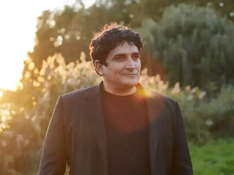Chef Mauro Colagreco in a garden scene.
