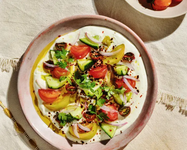 Tomatoes + Cucumber + Banana Peppers over Whipped Feta