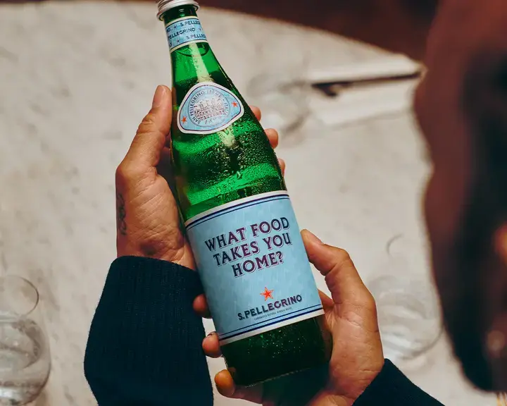 Lewis Hamilton with the S.Pellegrino limited edition bottle